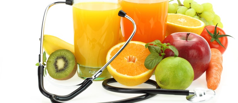 Healthy eating. Fruits, vegetables, juice and stethoscope